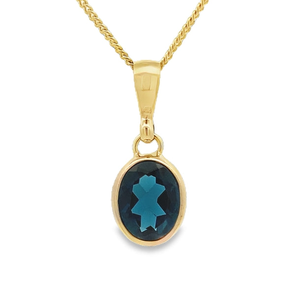 9ct Yellow Gold 9x7mm Oval Bezel Set London Blue Topaz Pendant
